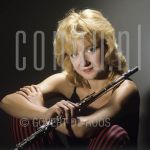 Berdien Stenberg (Date Unknown) at studio in Amsterdam.

[keywords]Posed, Headshot, Eyecontact, Smiling, Flute[/keywords]